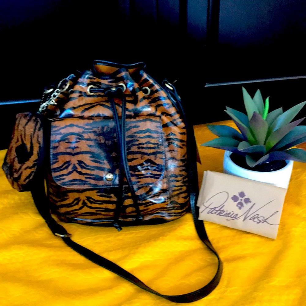 Brand new Patricia Nash purse! Lots of room front and back pockets, coin purse!